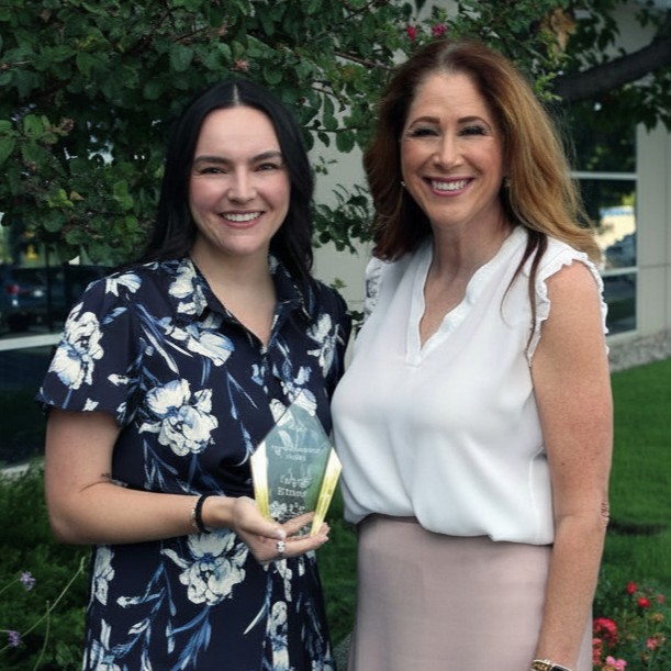 Kelsey Bonnet  with County Suprintendent holding award